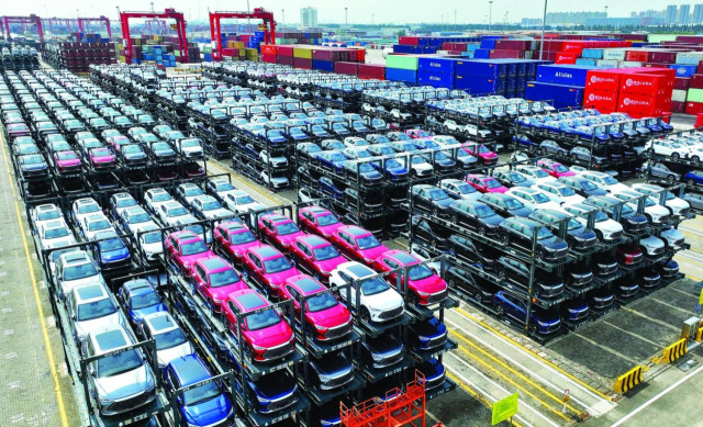 Picture shows BYD electric cars awaiting to be loaded onto a ship at the international container terminal of Taicang Port at Suzhou Port, in China eastern Jiangsu Province.